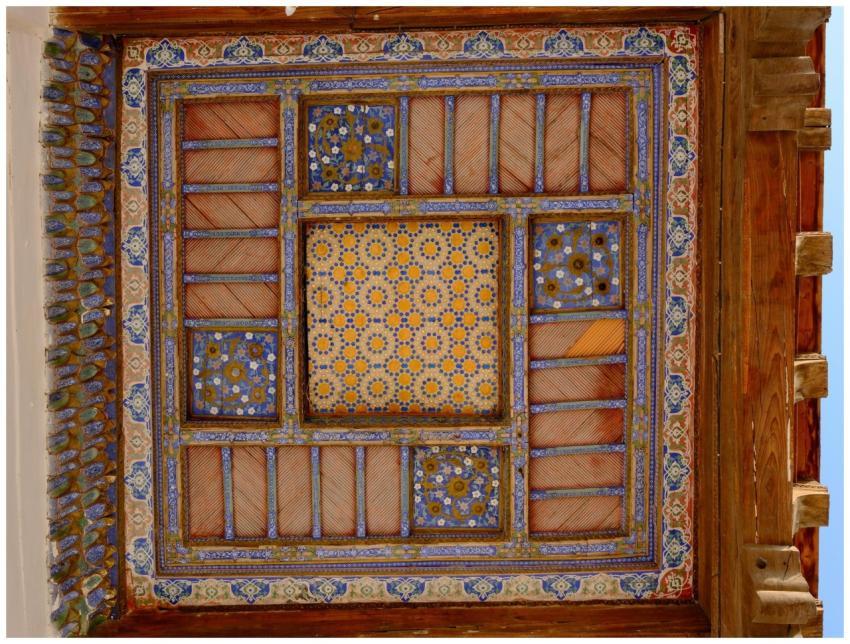 Detailed view of an ornate traditional ceiling sho