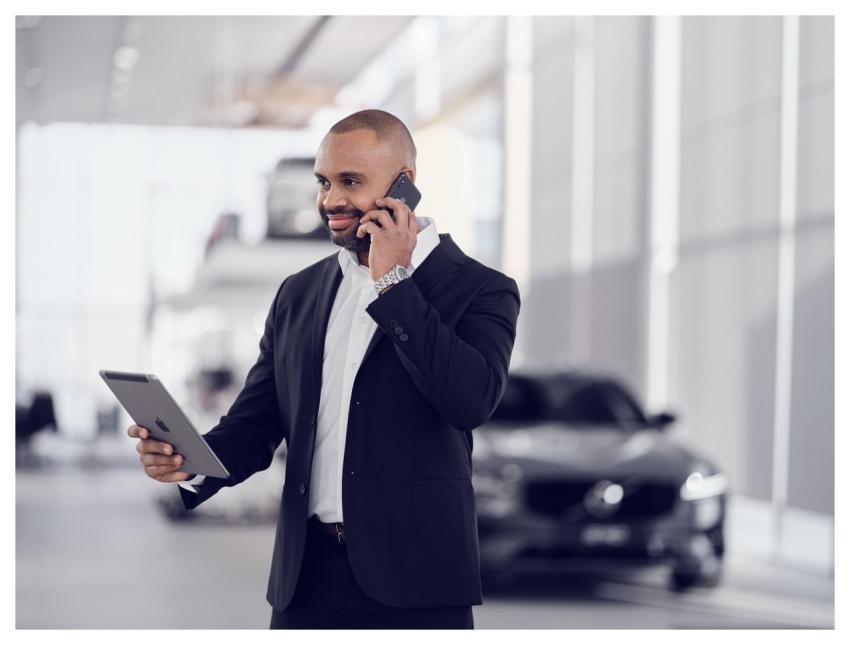 Man Phone Call Tablet