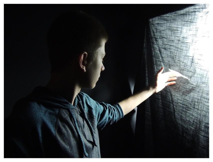 Boy Business Dark Indoors