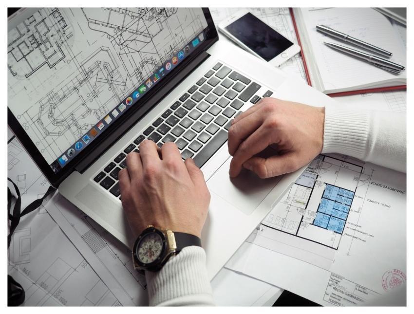 Blueprints Entrepreneur Hands Laptop