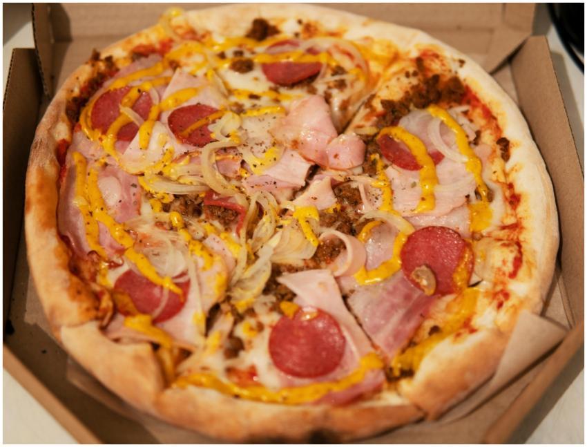 Mouthwatering pizza with pepperoni, melted cheese,