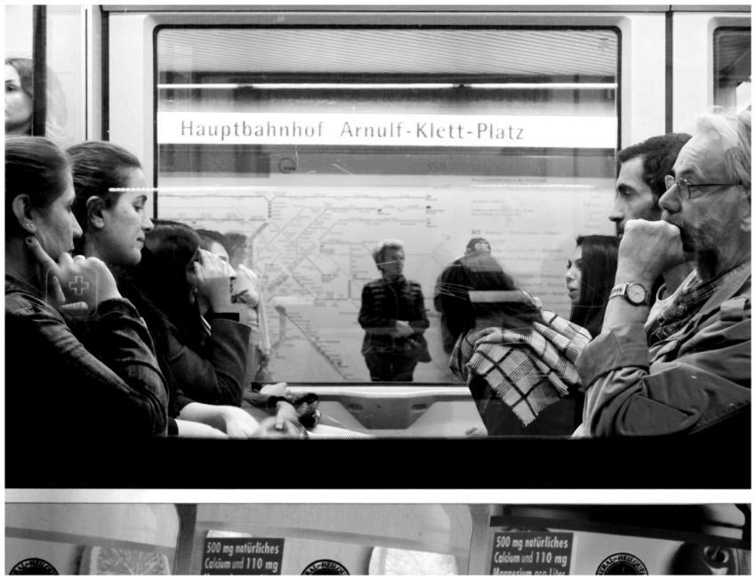 Group of people in Stuttgart metro station, captur