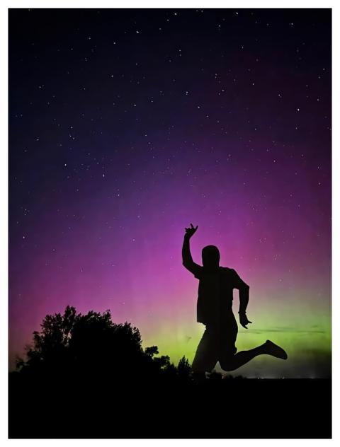 Man Running Silhouette Northern Lights