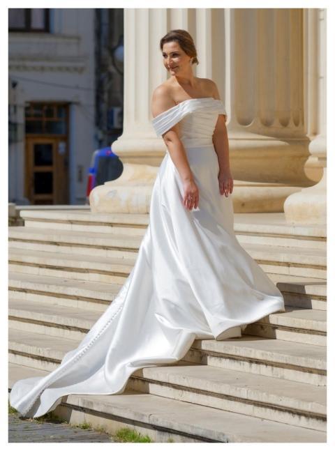 Woman Ties White Dress Posing