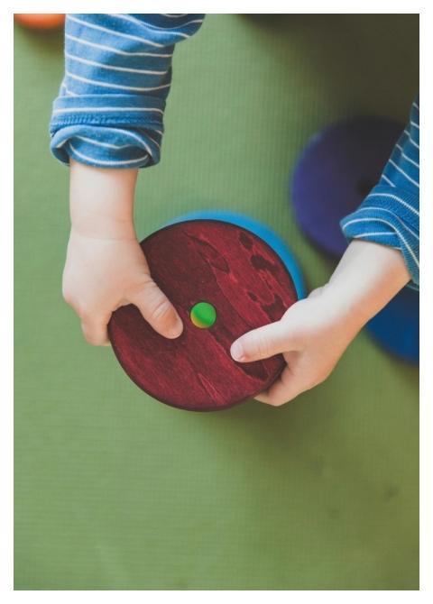 Kid playing educational toy