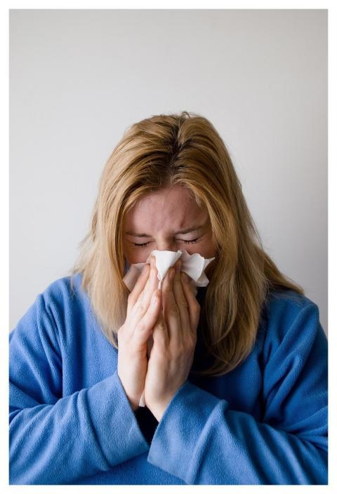 Woman Blow Blowing Nose