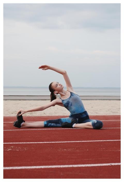 Girl Stretching Warming Up Run