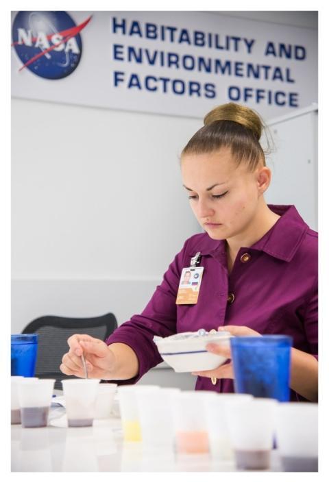 Cosmonaut Elena Serova Participates in a Food Tast