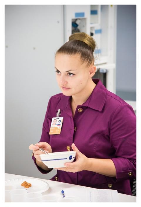 Cosmonaut Elena Serova Participates in a Food Tast