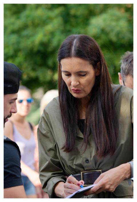 Woman Writing Paper Registration