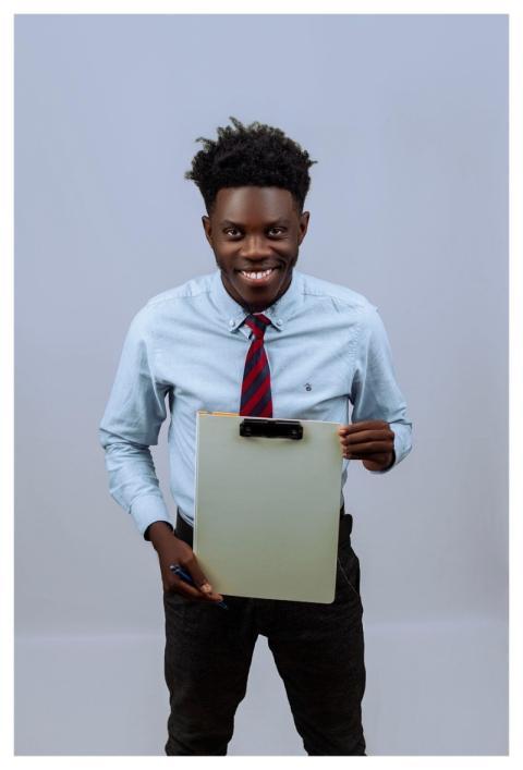 Young Man Smiling Clipboard Corporate