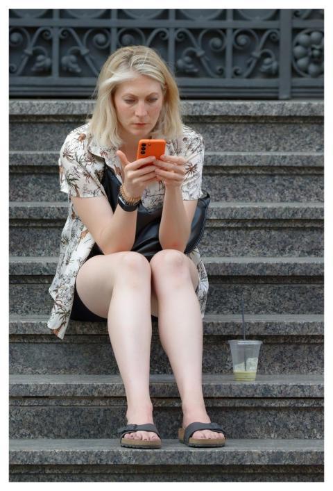 Woman Sitting Stairs Building