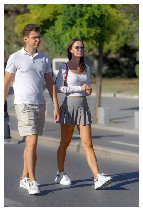 Couple Walking Sidewalk Young