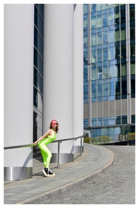 Young Woman Sports Tracksuit Pose