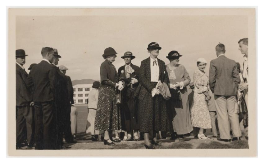 [Group standing sports field] (1920s
