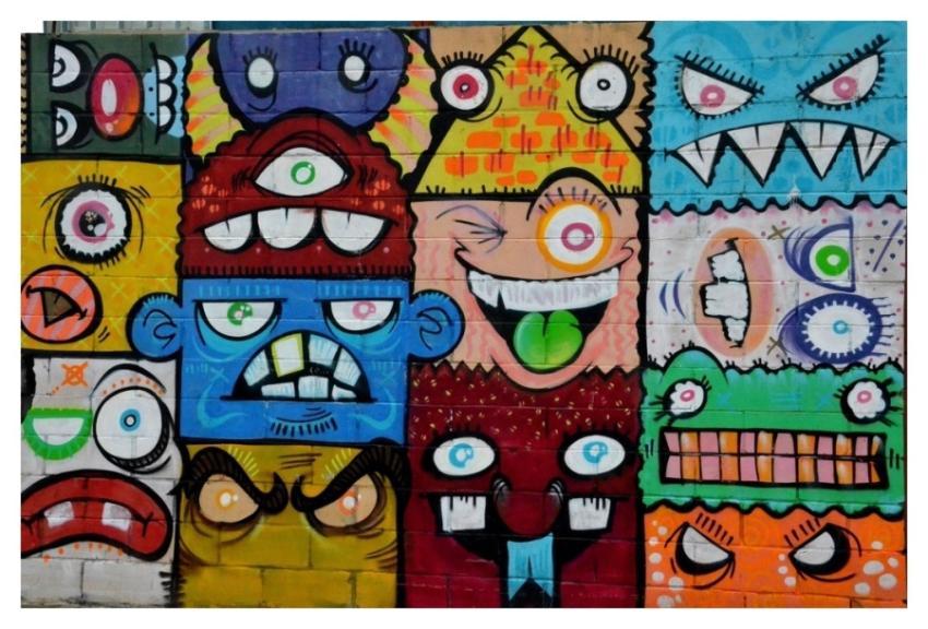 Colorful monster face graffiti art