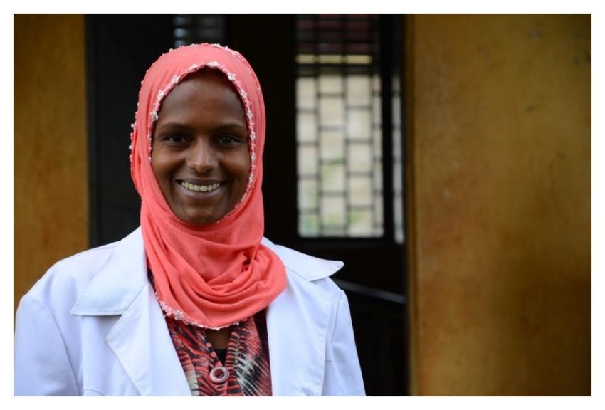 Ethiopian health worker outside health