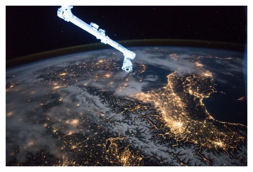 Canadarm 2 Over Night-time Earth
