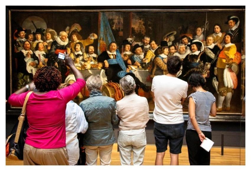 People viewing art museum