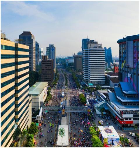 Aerial view of crowded Jakarta streets with tall b
