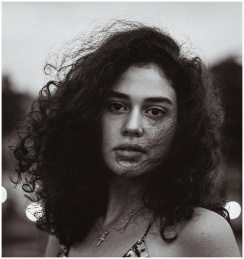 Captivating black and white portrait of a young wo