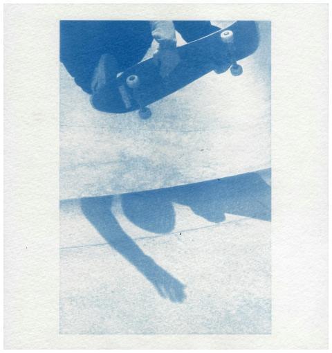 Capture of a skateboarder mid-trick using a vintag