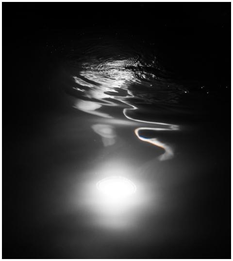 A captivating abstract reflection of light on a da