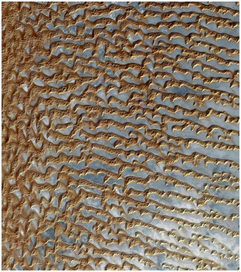 Captivating aerial view of intricate sand patterns