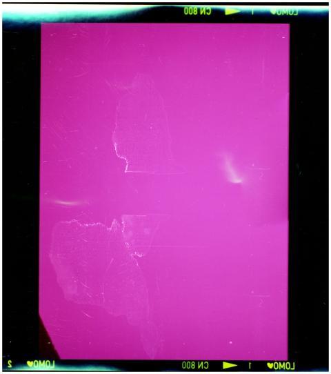 Colorful abstract purple texture with film border,