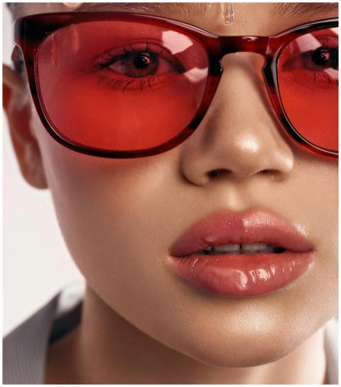 Stylish close-up portrait of a woman wearing red s