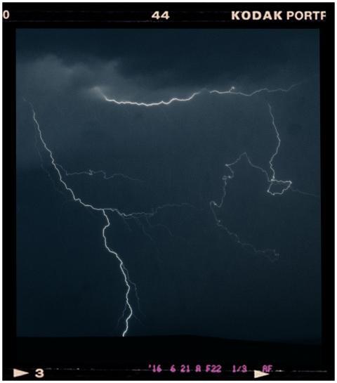 Dramatic lightning strike illuminating a thunderst