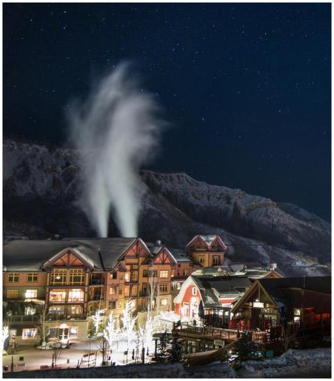 Charming winter night scene in Snowmass Village wi