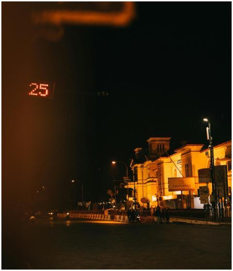 Nighttime urban scene with illuminated buildings a