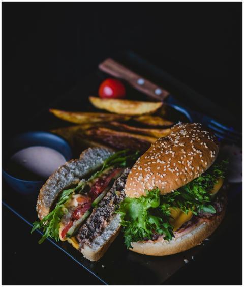 Savor this classic cheeseburger with fries, perfec