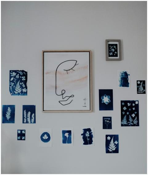A creative wall display showcasing cyanotype print