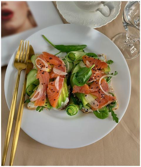 Delicious smoked salmon with avocado toast garnish