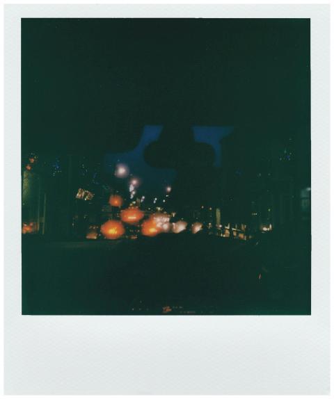 A captivating instant film photograph of blurred s