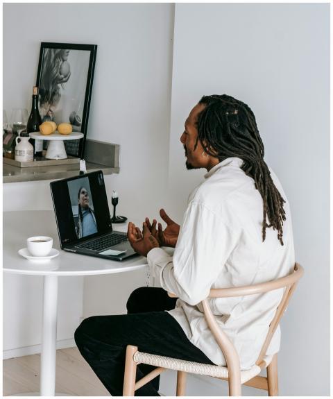 African American man having a video call at home w