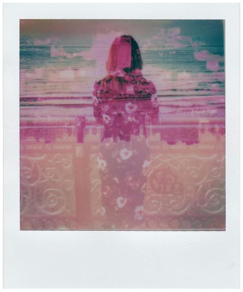 Abstract polaroid image of a pink silhouette by th