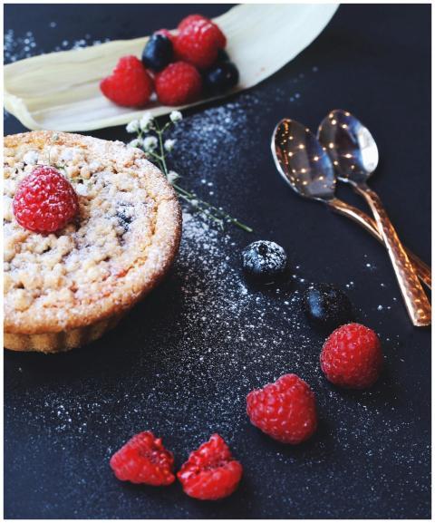Close-up of a scrumptious berry tart adorned with