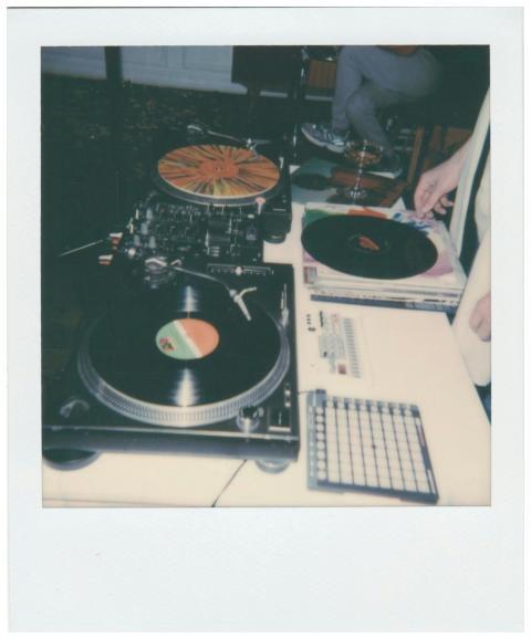 Vintage DJ setup featuring vinyl records and turnt
