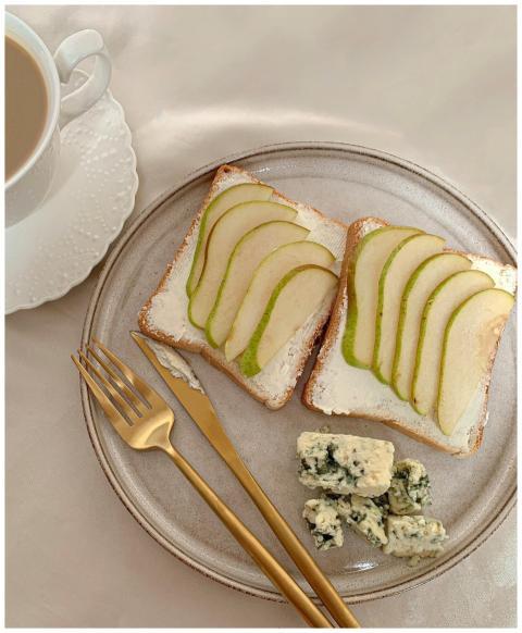 Delicious pear slices and cheese on toast for a he