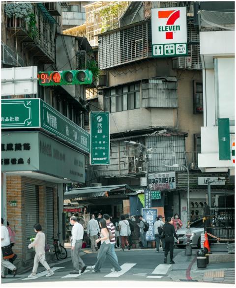 Lively street scene in Taipei featuring pedestrian