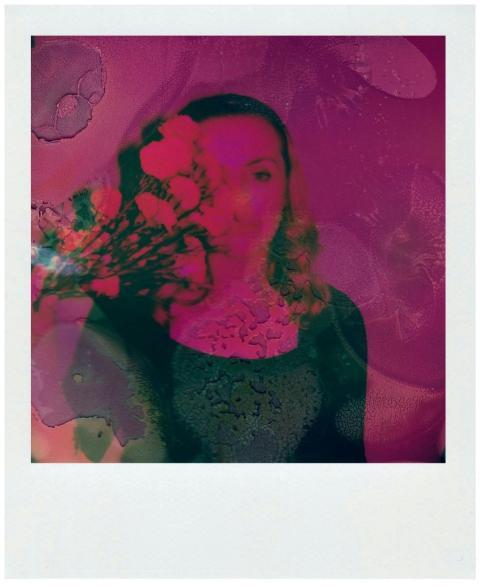 Artistic Polaroid image featuring a silhouette and