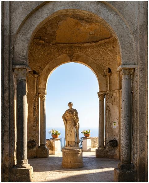 Elegant Roman statue under arches at Villa Cimbron