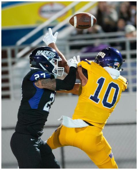 Exciting capture of two football players in a clos