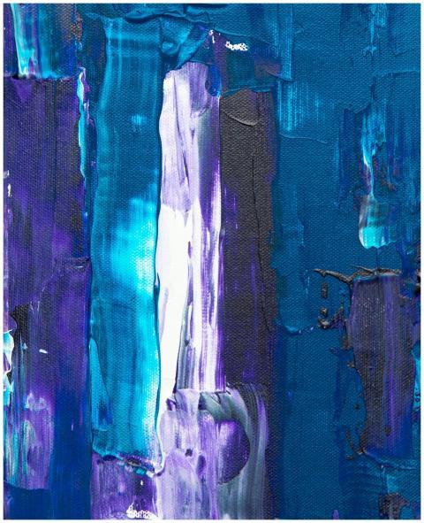 Close-up of a vibrant blue abstract painting on ca