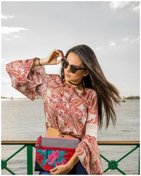 Portrait of a fashionable woman wearing sunglasses