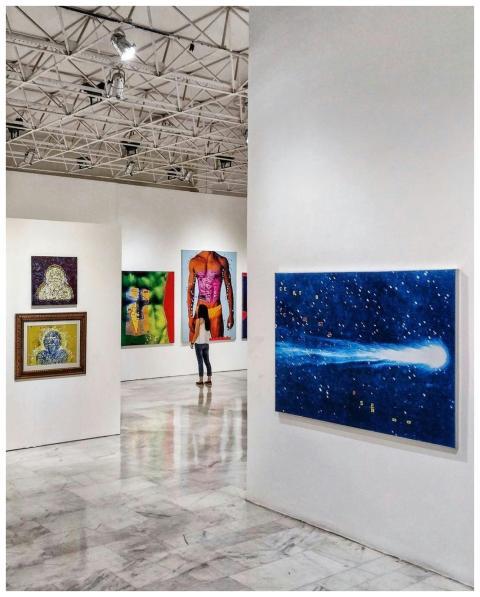 Gallery showcasing diverse contemporary art pieces