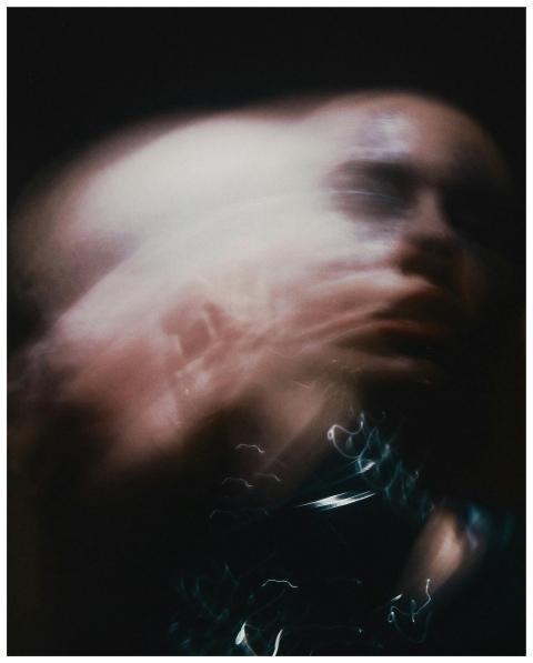 Artistic blurred portrait capturing dynamic motion